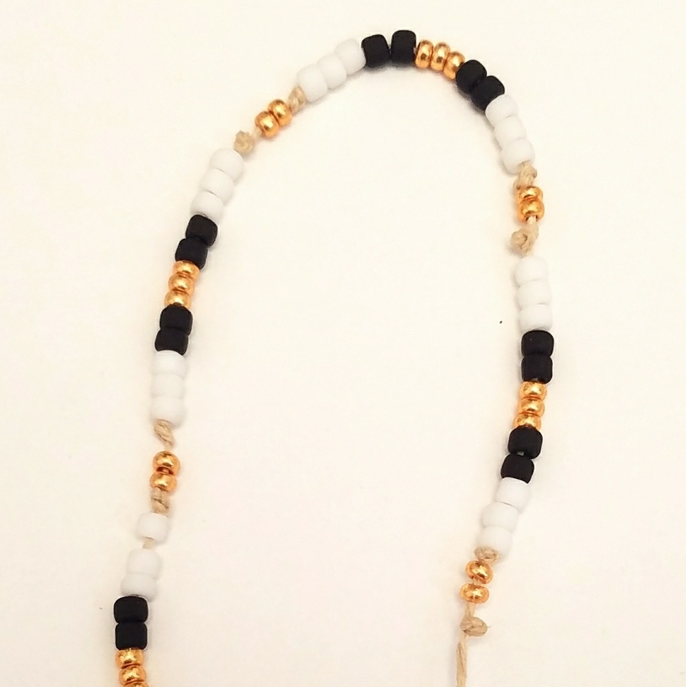 Black white and gold beaded bracelet